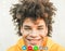 Mixed race young man portrait - Happy afro guy smiling in front of camera - Millennial generation and multi ethnicity concept -