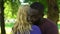 Mixed raced happy couple, black man embracing woman, interracial relationship