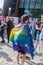 Mixed Rainbow flag LGBT and Europe Union on member of LGBTQ pride parade