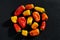 Mixed red, orange and yellow peppers