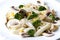 Mixed salad with eggs, pasta, mushrooms and chicke