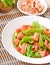 Mixed salad of fresh vegetables with pieces of salmon