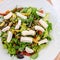 Mixed salad with goat cheese and roasted vegetables