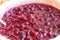 Mixed with sugar fresh juicy ripe raspberries should give juice before pouring into cans