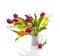 Mixed tulips in a jug