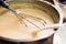 Mixing batter or dough for pancake or making desserts.Close up ,