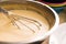 Mixing batter or dough for pancake or making desserts.Close up ,