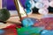 Mixing colorful paints with brush on wooden artist\\\'s palette, closeup