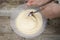 Mixing raw dough in bowl. Baking cake, muffin or homemade pastry