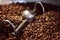 Mixing roasted coffee closeup. A batch of freshly roasted aromatic coffee beans cool down after emerging from a roaster. Modern ma