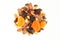 Mixture of dried fruits and nuts isolated on white background.Pile of dry apricots,prunes,candied cranberries,raisins and pumpkin