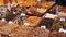 Mixture of Racks with dates dry fruits Raisins and nuts in the market La Boqueria in Barcelona,Spain