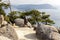 Miyajima, Japan - December 28, 2009: Woman admiring beautiful view on sea island. Miyajima is a small island outside the city of