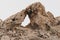 Mleiha Eye sedimentary rock formation in Fossil Rock and Al Fayah mountain range, Sharjah, United Arab Emirates