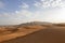 Mleiha Sand dune, deserts of Sharjah, with gold sand and blue sky