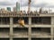 Mmoving liquid concrete into the tower crane bucket at the construction site sanpada Navi Mumbai