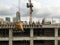 Mmoving liquid concrete into the tower crane bucket at the construction site sanpada Navi Mumbai