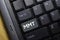 MMT write on keyboard isolated on laptop background