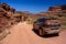 Moab, Utah, USA - June 15, 2015: Jeep Cherokee on a White Rim road Shafer Trail road in Canyonlands national park