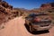 Moab, Utah, USA - June 15, 2015: Jeep Cherokee on a White Rim road Shafer Trail road in Canyonlands national park