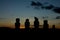 Moai platform silhouette at dusk in easter island