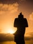 Moai silhouette during the sunset in easter island.