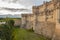 Moat and partial view of the walls of the castle of Coca Gothic style Mudejar Spanish. Coca. Segovia. Spain