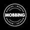 Mobbing - sociological term, means bullying of an individual by a group, text concept stamp