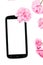 Mobil smart phone surrounded by pink cherry flowers