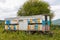 Mobile apiary trailer in meadow. View of Adygea republic nature, Russia