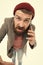 Mobile call concept. Important conversation. Man bearded hipster hold mobile phone white background. Stylish guy use