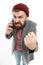 Mobile call concept. Man bearded hipster hold mobile phone white background. Stylish guy use mobile phone. Difficulties