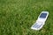 Mobile cell phone on grass outside