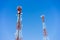 Mobile (cellular) tower antennas with blue sky background.