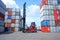 Mobile cranes and containers In the cargo storage yard