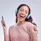 Mobile, headphones or happy girl dancing to music or singing radio songs in studio on white background. Dance, smile or