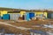 Mobile metal containers for the placement of a work crew on a construction site in winter. A temporary residential town of