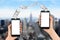 Mobile payment or money transfer with smartphone, Empire State Building and Financial District as background