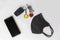 Mobile phone, black face mask, car keys with a yellow pendant, apartment keys with a red heart