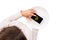 Mobile phone with icon of virtual electronic gold money bitcoin served on empty plate. Top view of a waitress in a white blouse on