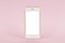 Mobile phone mock up on pink pastel background, technology and busiess concept