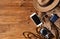 Mobile phone with powerbank on wooden table background.