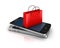 Mobile phone with shopping bag. Online shopping concept.