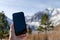Mobile phone and snow weather in the mountain
