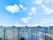 Mobile photo.  Residential high-rise building under the blue sky