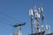 Mobile towers on blue sky background. Many communication equipment