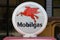 Mobilegas pegasus flyiing horse emblem on old gas pump in close up