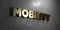 Mobility - Gold sign mounted on glossy marble wall - 3D rendered royalty free stock illustration