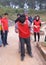 Moc Chau, Viet Nam - 07 December,2013: 3 people are standing on wooden skis to the destination in team activity of company with ha