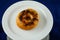 Mochaccino Donut or mocha served in plate Isolated on blue background side view of baked breakfast food